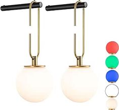 two lamps with different colored lights on each one and the same light attached to them