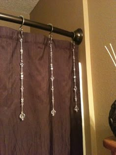 a curtain with some beads hanging from it