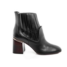 TOD'S - Rubber boot - Black #TODS Black Riveted Heeled Boots, Ankle-high Leather Moto Boots With Steel Toe, Black Riveted Ankle Boots, Black Ankle-high Moto Boots With Rivets, Black Ankle-high Riveted Moto Boots, Rubber Boot, Nappa Leather, Leather Cover, Leather Heels