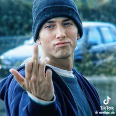 a young man making the vulcan sign with his hand