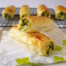 some food that is sitting on top of a paper towel next to a cooling rack