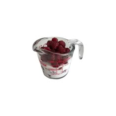 raspberries in a blender on a white background