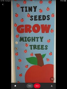 a door decorated with an apple and the words tiny seeds grow mighty trees