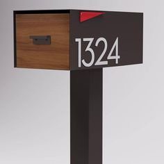 a mailbox with the number 1234 on it's front and side panel