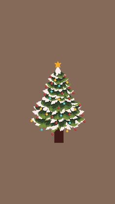 a christmas tree with lights on it in front of a brown background and an orange star