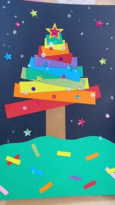 a christmas tree made out of construction paper