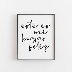 a black and white poster with the words est ess ni lasga feliz