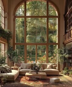 a living room filled with lots of furniture and large windows above it's floor to ceiling windows