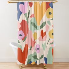 a colorful shower curtain with flowers on it