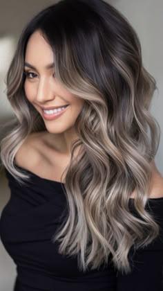 Discover the top ombre hair color trends for 2025 with these 20 stunning ideas. From classic ombre hair color for brunettes and black hair to bold shades like pink, red, and blue, this guide covers it all. Whether you're looking for light and subtle caramel tones or vibrant ombre hair color for dark brown hair, we’ve got the perfect look for you. Balayage Ombre For Dark Brown Hair, Dark Brown Hair With Blonde Ombre, Brunette To Blonde Ombre Balayage, Winter Ombre Hair Color For Brunettes, Edgy Ombre Hair, Ombre Hair Color For Dark Hair, Milk Tea Ombre Hair, Dark Brown Ombré Hair, Balayage Hair Black Roots