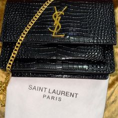 Yves Saint Laurent Paris, Crocodile Embossed Black Medium Shoulder Bag, Size: Medium Strap Length: 12-21 Exterior Material: Crocodile Embossed Includes: Dustbag Made In: Italy Yves Saint Laurent Paris, Saint Laurent Bags, Yves Saint Laurent Bags, Saint Laurent Paris, Black Media, Yves Saint Laurent, Limited Time, Saint Laurent, Dust Bag