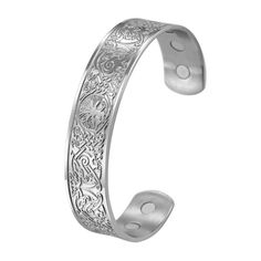 PRICES MAY VARY. Parameters: diameter 64mm (2.52’’), surface width 14.62mm (0.58’’), weight 28.76g. One size fits most. Product contains 6 pieces of magnets. Elaborate engraving trees and birds on the cuff; ideal daily wearing jewelry for elegant men. Each bracelet comes with a velvet gift bag. Our elegant bracelet is adjustable and fits most size wrists. 
 Each bracelet will come with a brand velvet gift bag. 
 We offer not only fashion jewelry, but also high satisfaction customer service. 
 Fe Magnetic Silver Round Jewelry, Adjustable Silver Magnetic Bracelet, Adjustable Silver Magnetic Bracelets, Magnetic Silver Metal Jewelry, Adjustable Magnetic Silver Bracelets, Silver Magnetic Bracelet Jewelry, Silver Magnetic Bracelet, Nordic Tree Of Life, Nordic Tree