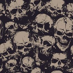 a lot of skulls that are all over the place with black and white paint on them