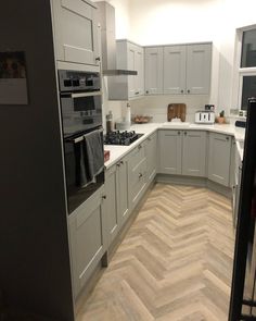 the kitchen is clean and ready for us to use in its new owner's home