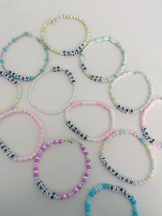 These adorable bracelets make amazing gifts for a sister, daughter, mother, or friend! You may purchase one of the pre made bracelets you see in the photos, of submit a custom name or phrase you want to customize the bracelet with! ♥️ Handmade with love and care ♥️ Adorable catchphrases   ♥️ Stretch elastic to fit all wrists ♥️ Light pastel colors to go with every outfit Available pre made bracelet's: "Pookie" "Be You" "Cutsey" "I Love You" "Love Urself" "Demure" "Ur Cute" "See the Good" Names To Put On Bracelets, Personalized Pink Beaded Bracelets, Personalized Pink Beaded Bracelet With Meaningful Style, Inspirational Letter Beads Beaded Bracelets For Gifts, Inspirational Letter Beads Beaded Bracelet For Gift, Inspirational Letter Beads Bracelet For Gift, Cute Beaded Name Bracelet As A Gift, Cute Beaded Name Bracelet Gift, Cute Beaded Name Bracelet As Gift