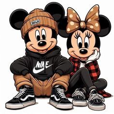 two mickey and minnie mouse sitting next to each other