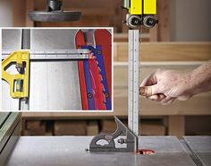 a man is working with tools on a table sawing machine and measuring the width