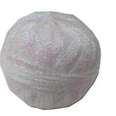 a white hat with pink and silver sequins on the brim, sitting in front of a white background