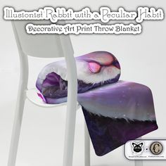 a cat sleeping on top of a purple chair next to a white chair with the caption decorative art print throw blanket