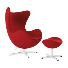 an egg chair and footstool are shown in red