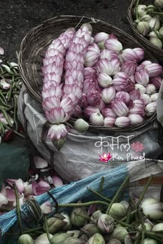 baskets filled with flowers sitting next to each other