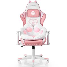 a pink and white chair with a stuffed animal on it's back, sitting in front of a white background