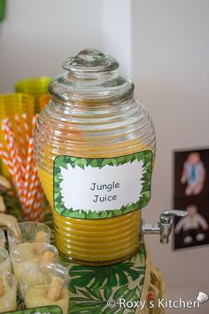 a jar of jungle juice sitting on top of a table