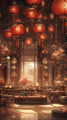 a room filled with lots of red lanterns hanging from the ceiling next to flowers and potted plants