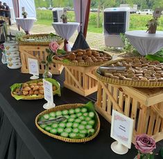 several baskets filled with pastries sitting on top of a table