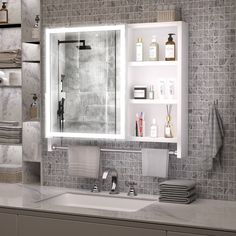 a bathroom with a sink, mirror and shelves filled with personal care items in it