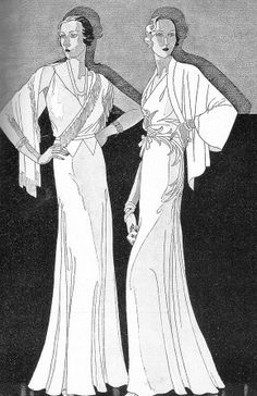 two women in evening dresses standing next to each other