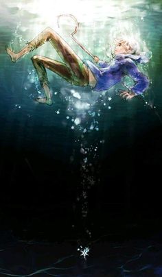 a woman is floating in the water with her legs spread out and head above the water's surface