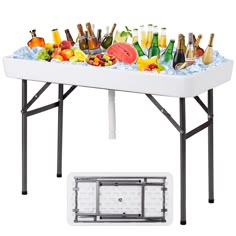 a white table topped with lots of different types of bottles and glasses on top of it