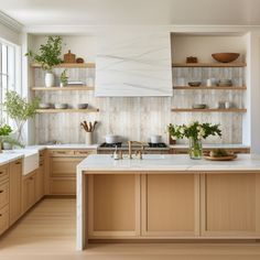 the kitchen is clean and ready for us to use it's natural wood accents