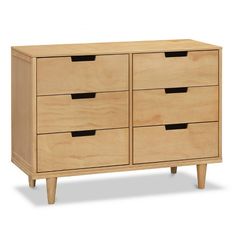 a wooden dresser with four drawers and three legs