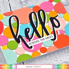 a card with the words relax across the miles on it and colorful confetti