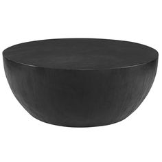 a large black bowl sitting on top of a table