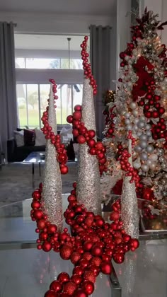 red and silver christmas decorations in a living room