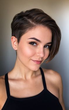 Upgrade your look with these 25 gorgeous pixie haircuts! From sleek to textured, these styles are perfect for a fresh start. #GorgeousPixie #NewYearNewLook #ShortHairStyles Girl Undercut Short Hair, Short Haircuts For Girls Teens, Girl Pixie Cut, Girls Pixie Haircut Kids, Kids Pixie Cut, Haircut Styles For Girls, Girls Pixie Haircut, Girls Pixie Cut, Pixie Haircut For Round Faces