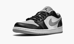 The Air Jordan 1 Low “Light Smoke Grey” is as wearable of a colorway as any in the expansive signature collection of Michael Jordan.  Keeping its color scheme muted in black, white, and grey, the “Light Smoke Grey” makeup is undoubtedly a classy look for the Jordan 1 that will anchor sneaker collections for years to come.  White leather can be found on the mid-panel and light grey leather covers the perforated toe.  Contrasting black leather overlays dot the forefoot, eyelets, collar, and heel. Jordan 1 Low Shadow, Grey Makeup, Blue Chill, Jordan 12 Retro, Swag Outfits For Girls, Nike Air Force Ones, Air Jordan 1 Low, Jordan 1 Low, Grey Shoes