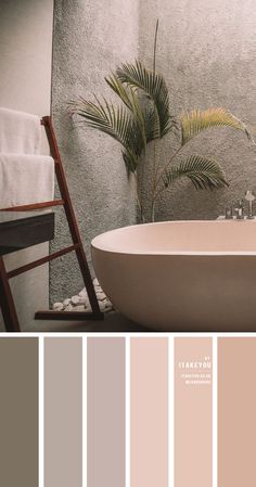 a bath tub sitting next to a wooden chair in front of a wall with palm trees