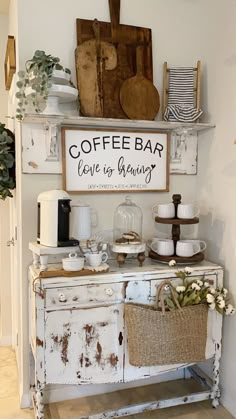 a coffee bar with an old cabinet and baskets on it