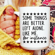 someone holding a coffee mug that says, some things are better left alone like me for distance