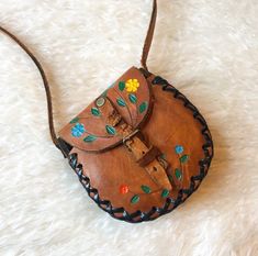 One of a kind floral painted   tooled leather small pouch purse! Authentic vintage, 1970s VINTAGE CONDITION! Leather is very worn and has done a lotta livin! 5 X 5 Body 17 Length with strap * For any additional info,please feel free to ask! Leather Flower Tutorial, Cuff Bracelets Diy, Popular Purses, Leather Bag Tutorial, Tooled Leather Handbags, Leather Bag Design, Chic Purses, Purse Boutique, Mens Bags Fashion