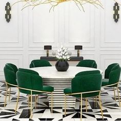 a dining room table with green chairs and a chandelier