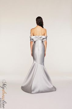 Looking for a show-stopping evening gown? Check out the Frascara 4231 Off-the-shoulder Gown. This gorgeous dress features a draped bodice and sleeve detail with an assymetrical bow. The mermaid silhouette is flattering and the hidden back zipper makes for easy on and off. Plus, the satin lining ensures a comfortable fit. 87% polyester, 13% silk. Elegant Strapless Dress With Bow For Evening, Elegant Evening Strapless Dress With Bow, Elegant Strapless Evening Dress With Bow, Luxury Satin Finish Formal Gown, Luxury Satin Finish Gown For Formal Occasions, Elegant Strapless Prom Dress With Bow, Elegant Strapless Dress With Satin Finish For Formal Occasions, Elegant Formal Strapless Dress With Satin Finish, Elegant Satin Gown With Fitted Bodice