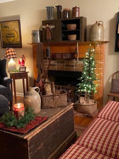 a living room filled with furniture and a christmas tree on top of a coffee table