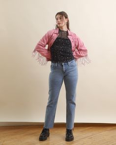 Rock the fringe trend with our Pink Western Sequin Embellished Fringe Jacket! This lightly washed pink denim style features a button-up design, eye-catching sequined fringe and a long sleeve fit that adds an instant touch of glam to your look. Keep it casual with a graphic tee and jeans, or add some sparkle with a glitter mesh top and flare pants for your next night out. Fall Denim Jacket With Beaded Fringe And Long Sleeves, Trendy Spring Denim Jacket With Rhinestone Fringe, Beaded Fringe Long Sleeve Outerwear For Spring, Trendy Beaded Fringe Fall Outerwear, Long Sleeve Outerwear With Beaded Fringe For Spring, Spring Denim Jacket With Beaded Fringe And Long Sleeves, Casual Denim Jacket With Rhinestone Fringe, Spring Party Outerwear With Rhinestone Fringe, Casual Long Sleeve Denim Jacket With Rhinestone Fringe