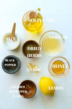 the ingredients to make homemade lemonade are shown in small bowls on a white surface