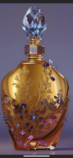 a golden bottle with blue and purple flowers on the front, surrounded by crystal stones